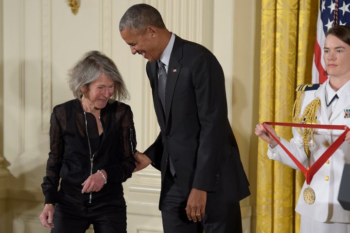 In this Sept. 22, 2016, file photo President Barack Obama presents poet Louise Gluck with the 2015 National Humanities Medal during a ceremony in the East Room of the White House in Washington.
