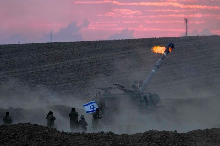 An Israeli mobile artillery unit fired a shell from southern Israel towards the Gaza Strip, in a position near the Israel-Gaza border, Israel, Saturday, Oct. 14, 2023. (AP Photo/Maya Alerruzzo)