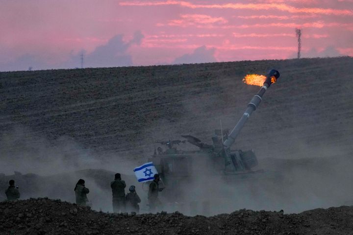 An Israeli mobile artillery unit fired a shell from southern Israel towards the Gaza Strip, in a position near the Israel-Gaza border, Israel, on Oct. 14, 2023. 