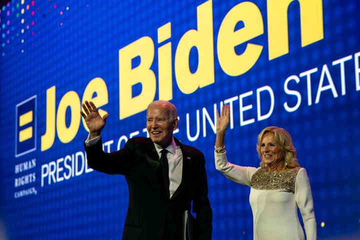 President Joe Biden and First Lady Jill Biden walk off stage after delivering remarks at the 2023 Human Rights Campaign National Dinner at the Washington Convention Center on Saturday in Washington, D.C.